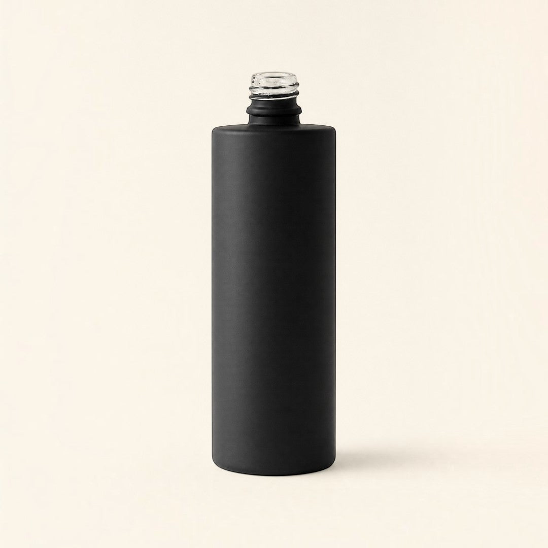 Pure Candle Supplies Melbourne 30ml cylindrical perfume bottle with a chic matte black finish on a neutral background