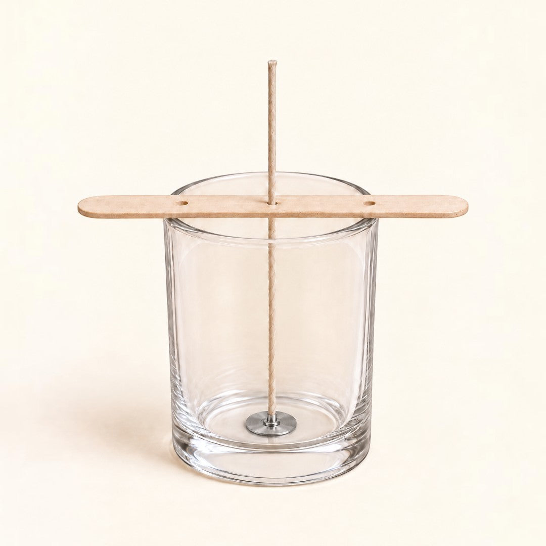 Pure Candle Supplies Melbourne PT35 flat braided candle wick with metal tab centered in a glass jar with wood holder