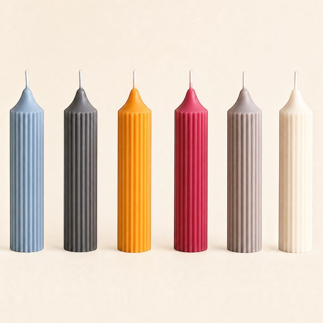 Pure Candle Supplies Melbourne ribbed column pillar candles in various vibrant colours standing in a row