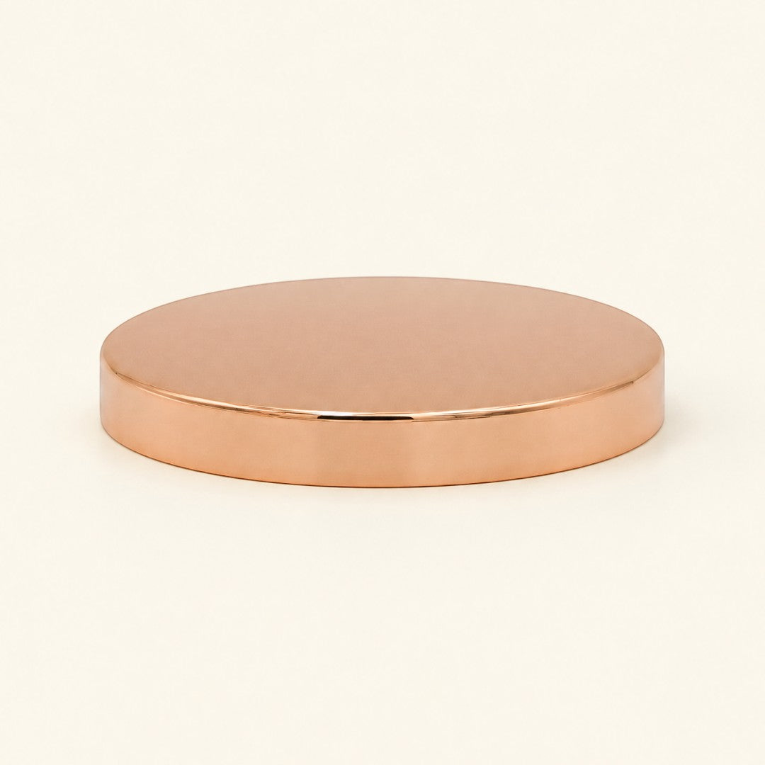 Pure Candle Supplies Melbourne medium rose gold metal candle jar lid with a shiny finish on a neutral background.
