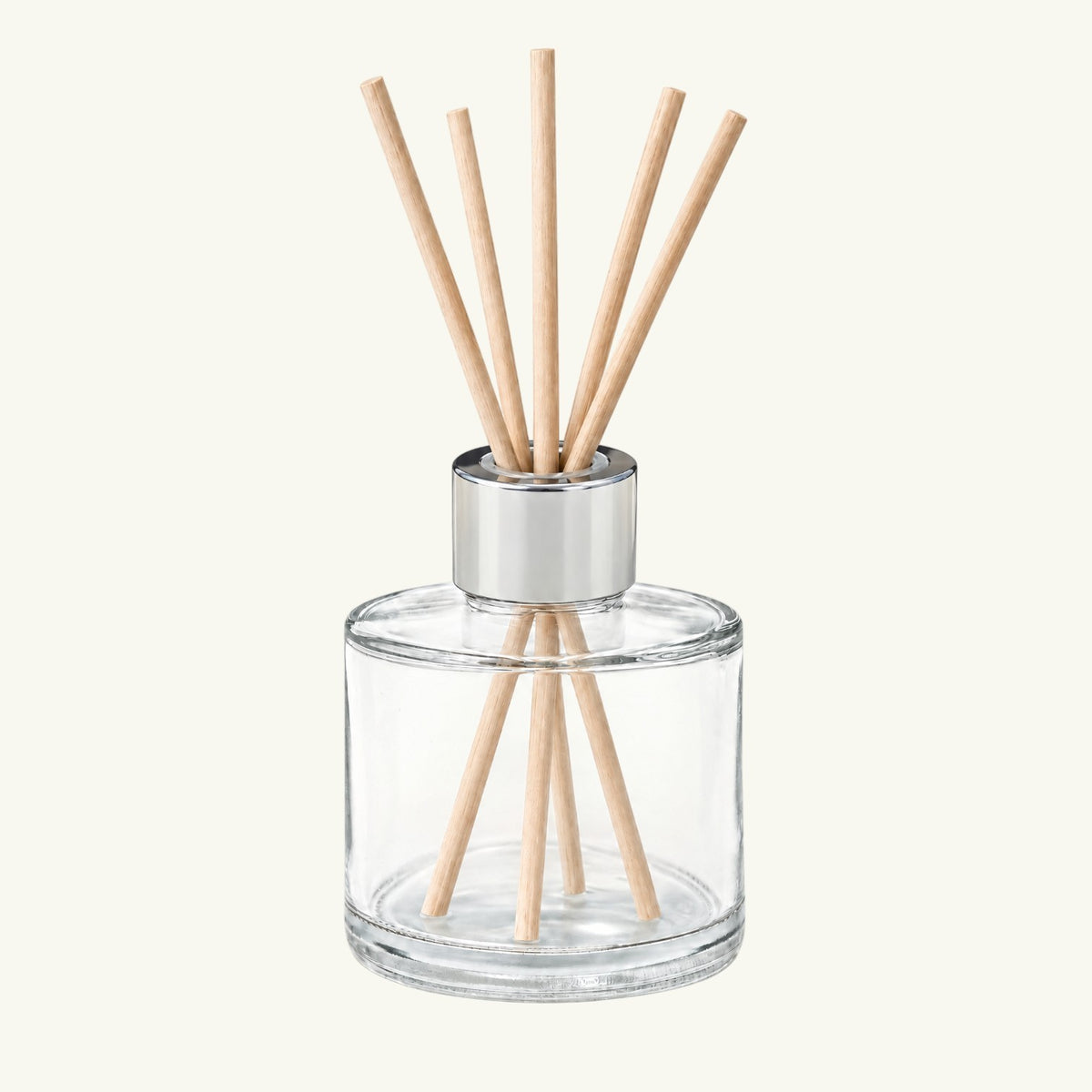 Pure Candle Supplies Melbourne silver screw-on diffuser cap on a clear glass base with wooden reed sticks