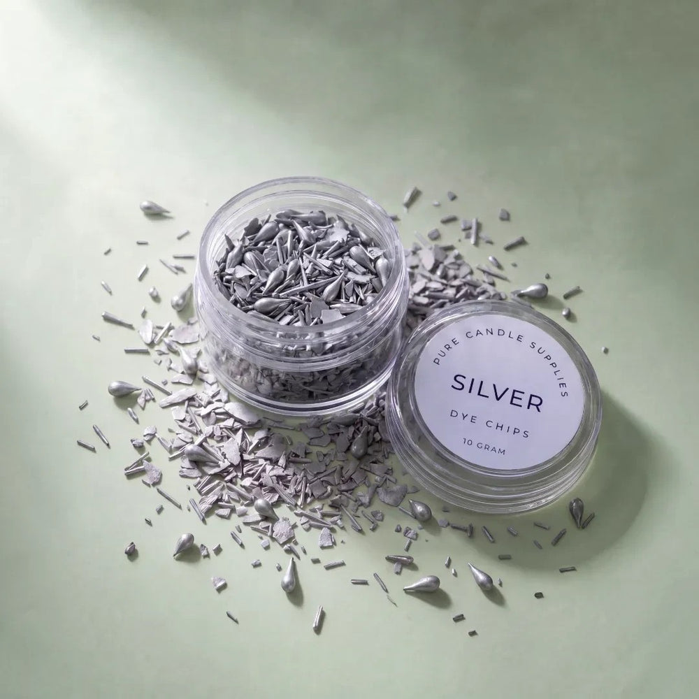 Pure Candle Supplies Melbourne silver candle dye chips in a clear jar on a soft green background