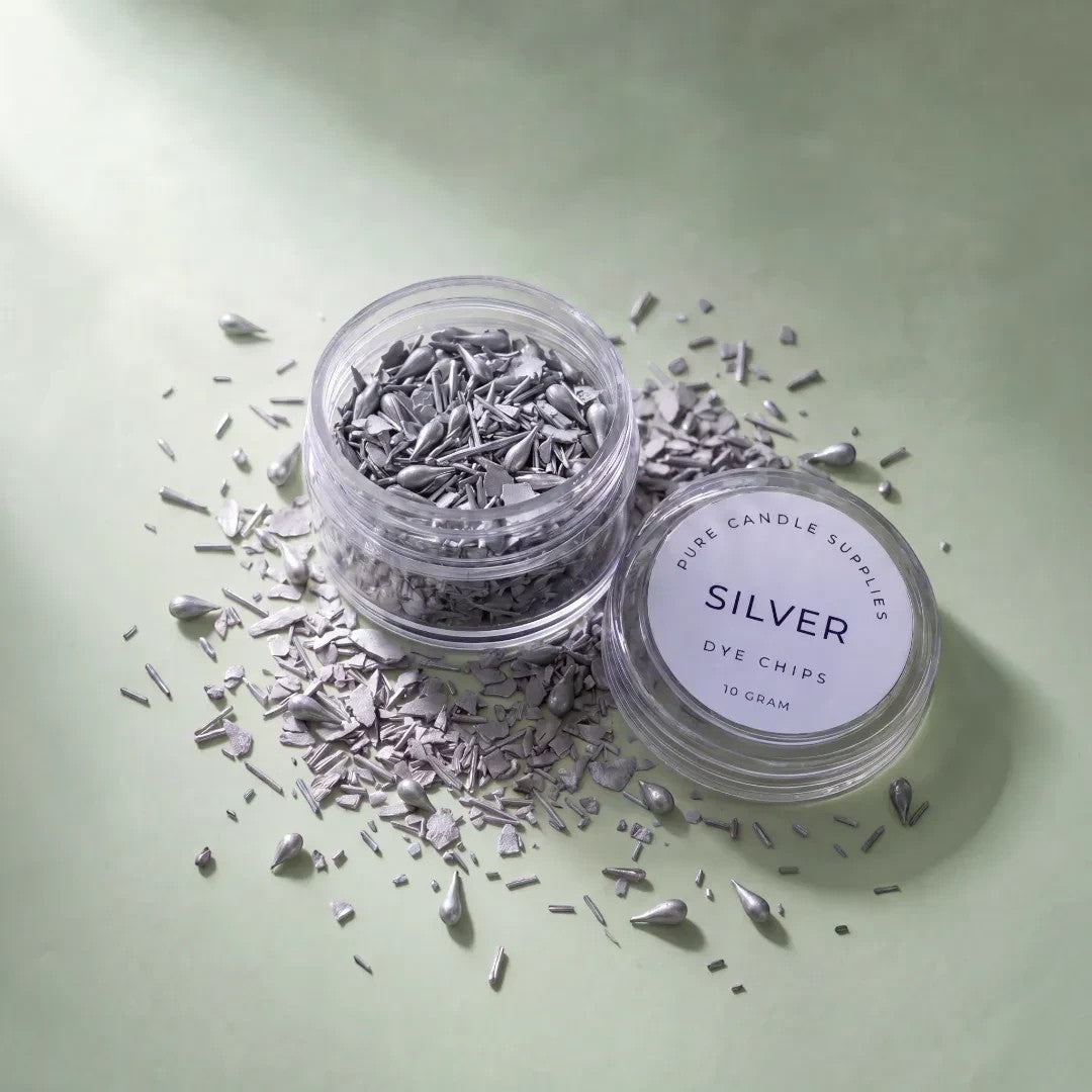 Pure Candle Supplies Melbourne silver candle dye chips in a clear jar on a soft green background