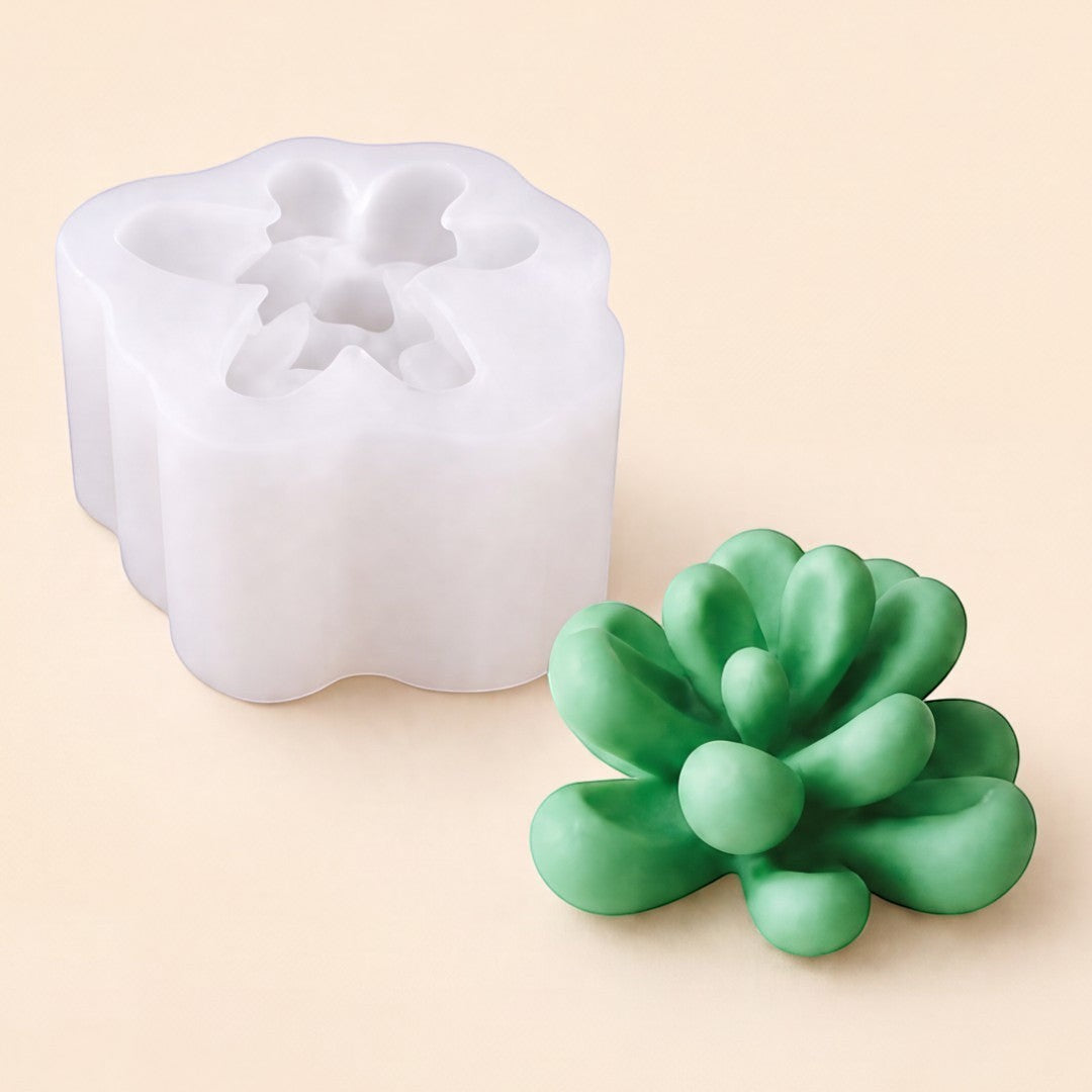 Pure Candle Supplies Melbourne flexible silicone succulent candle mould next to a finished green succulent candle