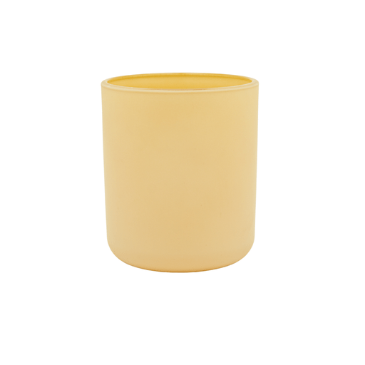 beige coloured round candle jar with curved base