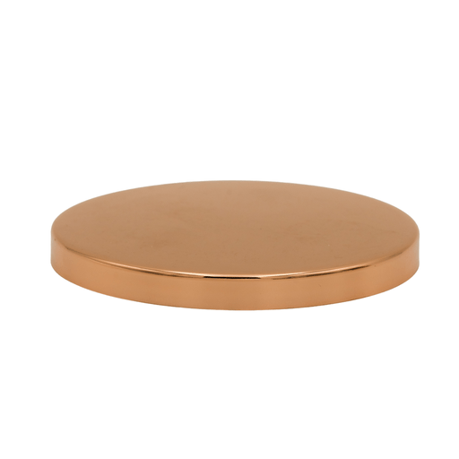 round shiny rose gold candle jar lid on white background