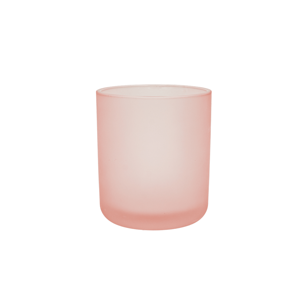 round frosted pink candle jar with curved base