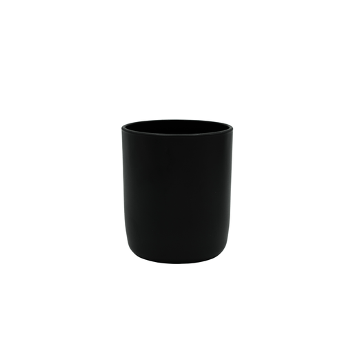 round matte black candle jar with curved base on white background