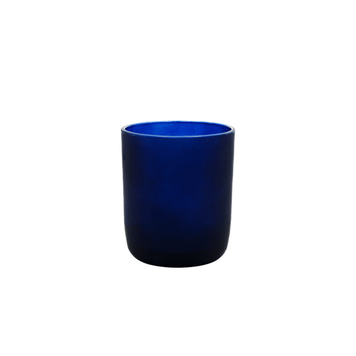 round small navy candle jar on white background