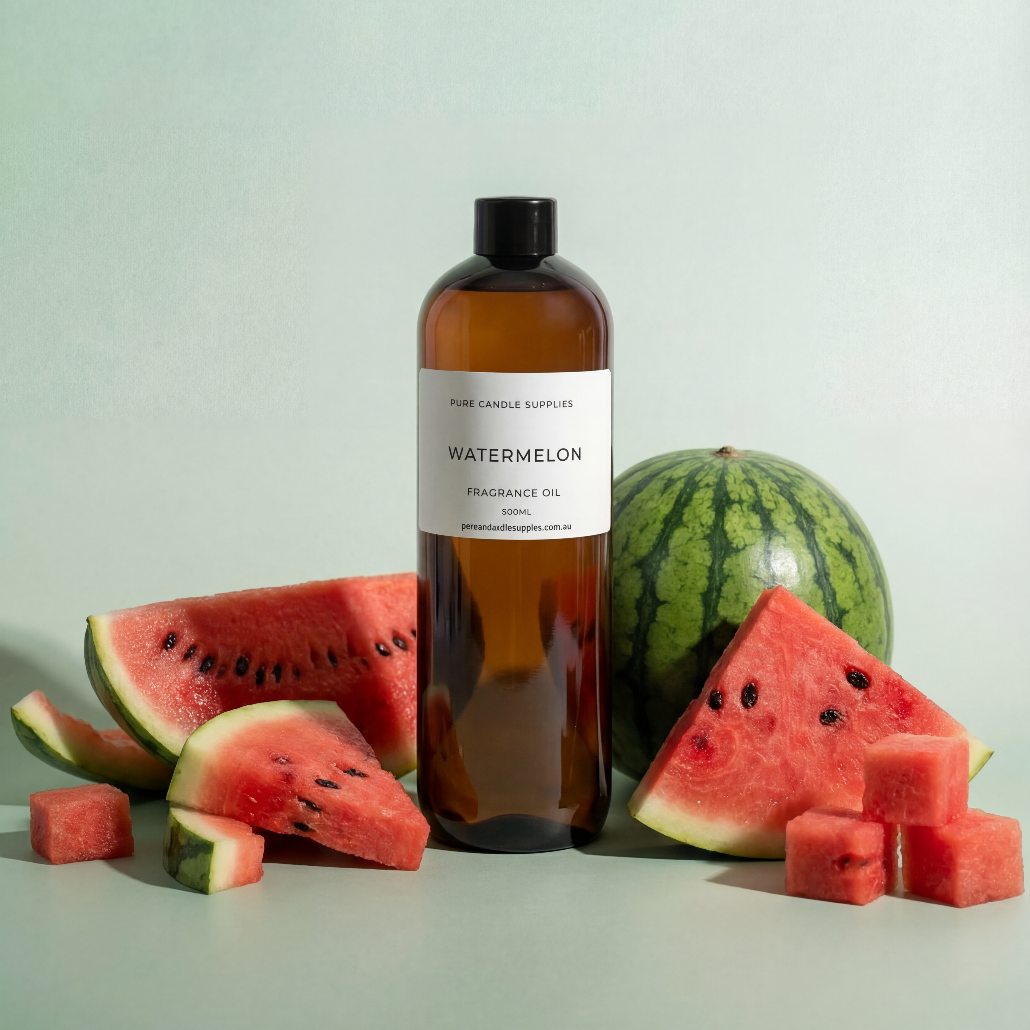 Bottle of watermelon-scented oil with watermelon slices on a light background