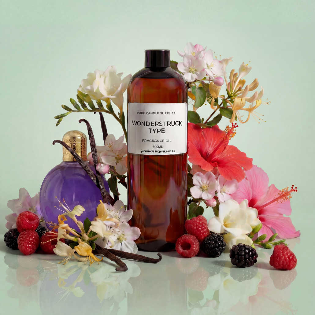 Bottle of Wonderstruck Type fragrance oil surrounded by flowers and berries on a light green background
