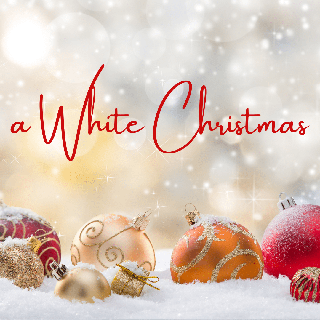 christmas tree baubles in various colours sitting in snow against a beige sparkly background with the words a white christmas written in red above 